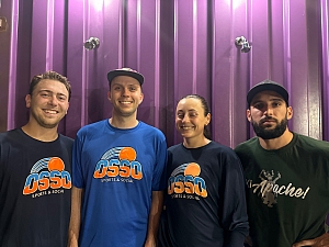 Sanding on Business Team Photo